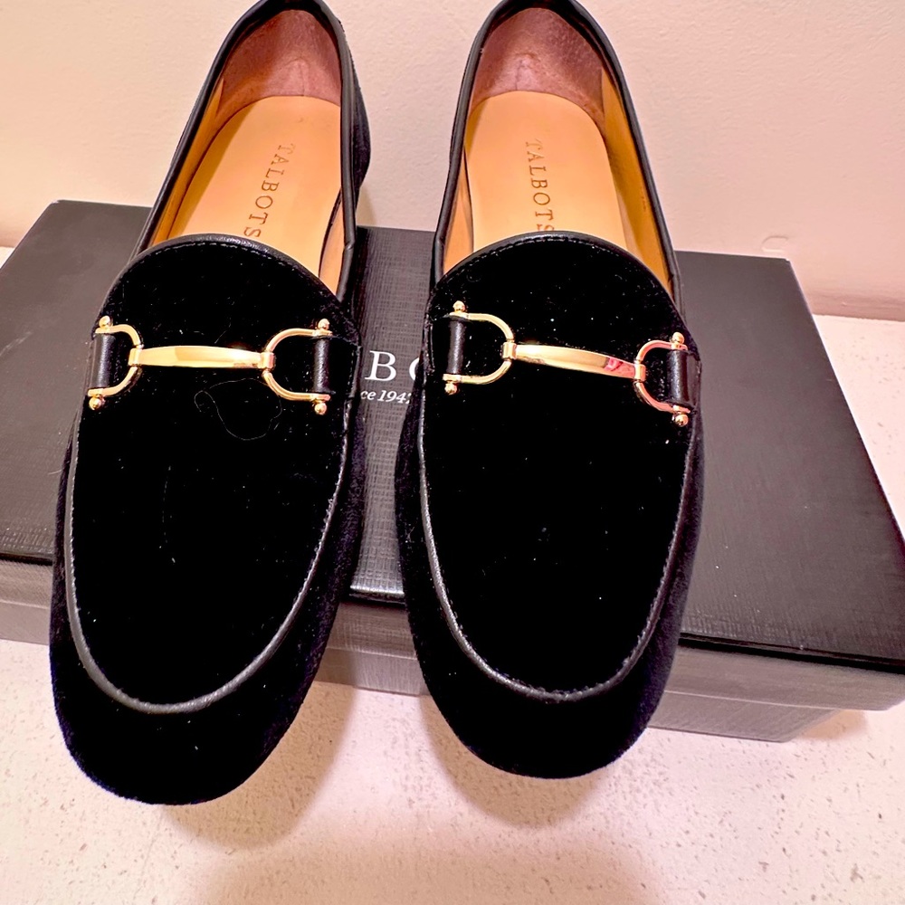 Black buckled loafers.